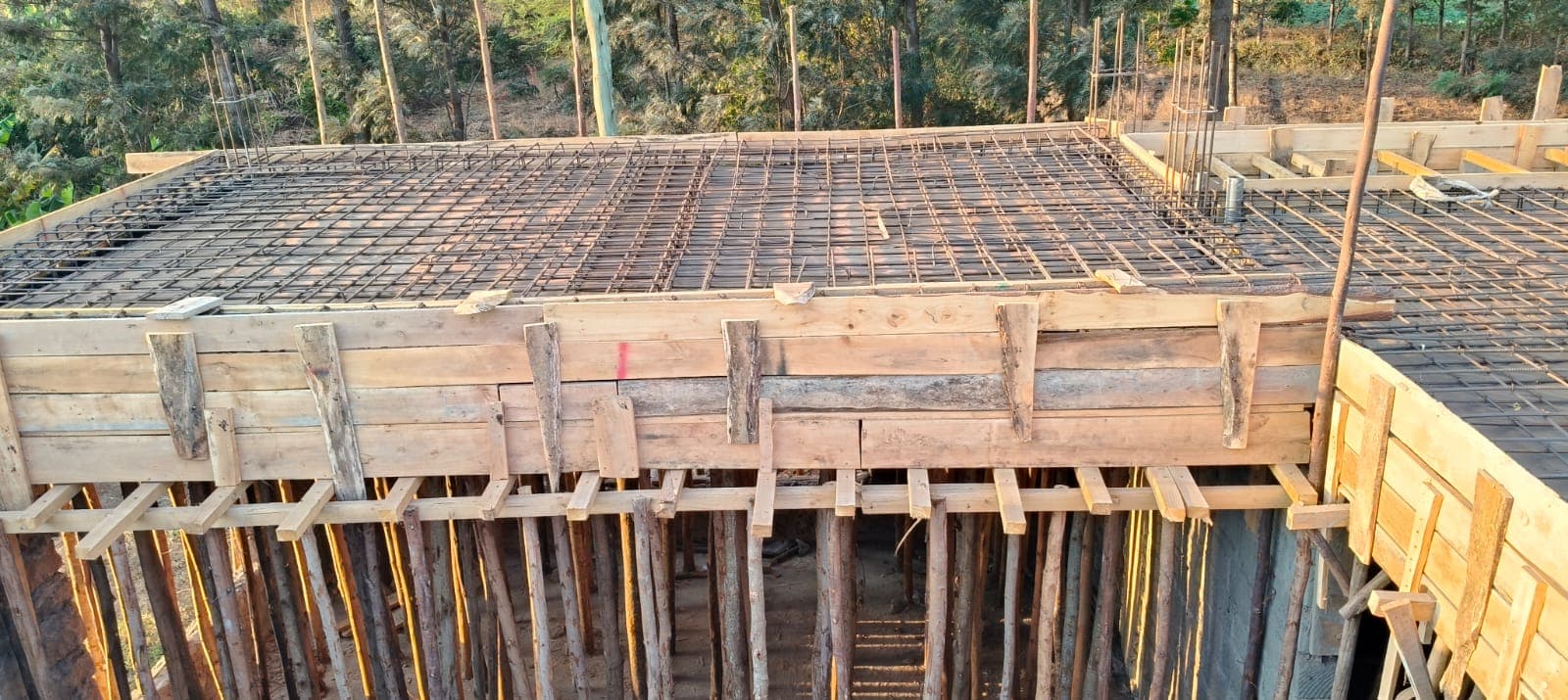Timber formwork and rebar mesh ready for a roof slab pour